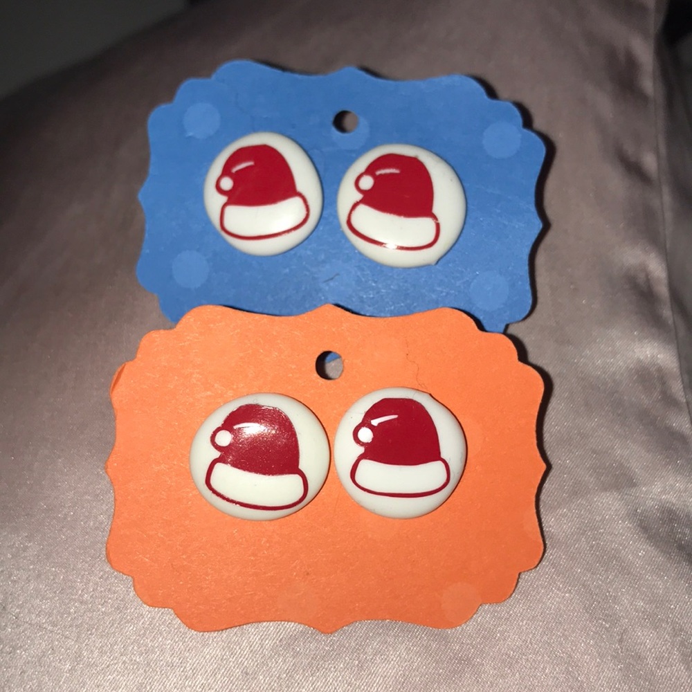 2 Matching Santa hat button earring pairs.